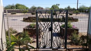 rh iron fab shop courtyard gate plasma cut floral design back view