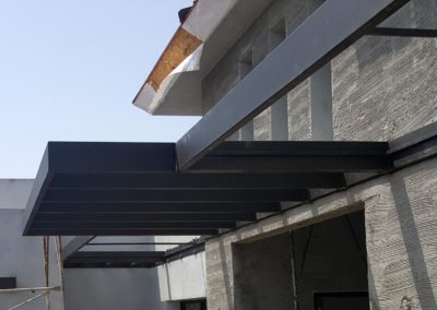 rh iron fab shop cantilevered entrance canopy side view