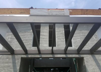 rh iron fab shop cantilevered entrance canopy