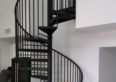 rh iron fab shop interior spiral staircase entrance