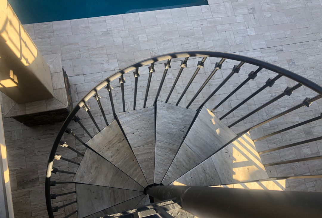 Exterior Spiral Staircase with Travertine